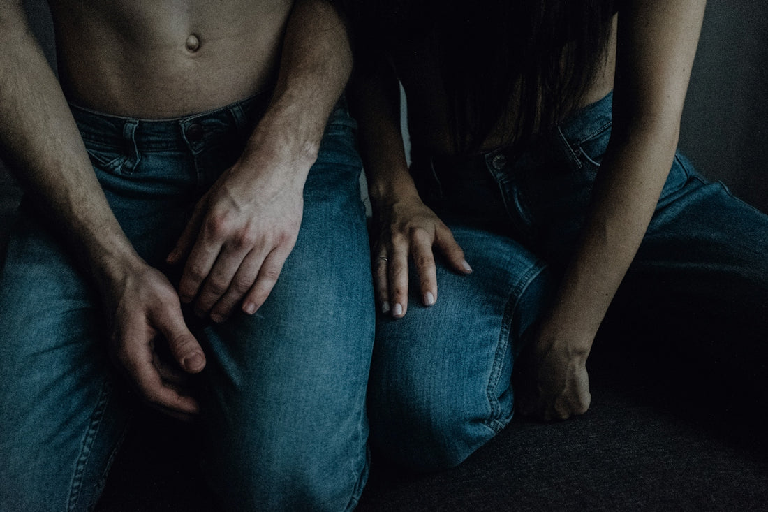 man in blue denim jeans