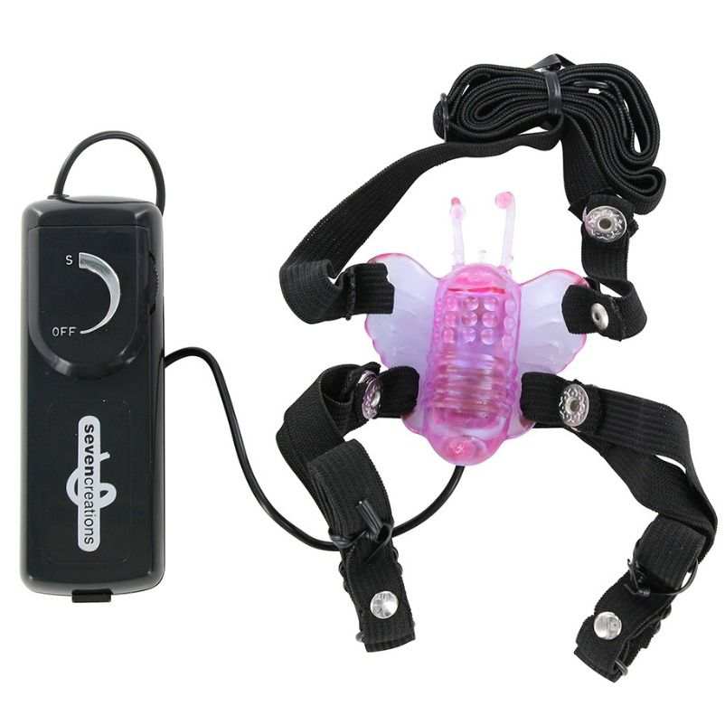 SEVEN CREATIONS pink butterfly vibrator with adjustable intensity and hands-free straps, waterproof and battery-operated.
